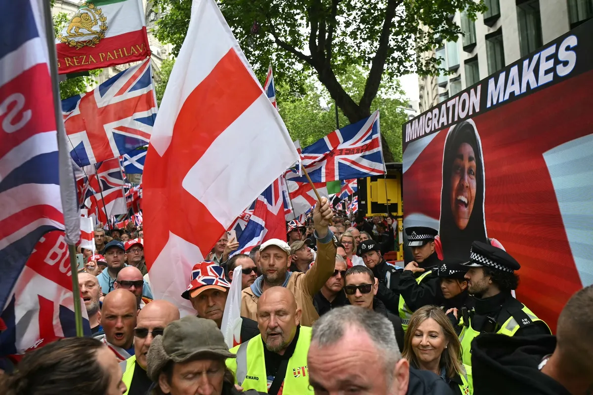 Activists troll far-right UK rally with giant pro-immigration clip