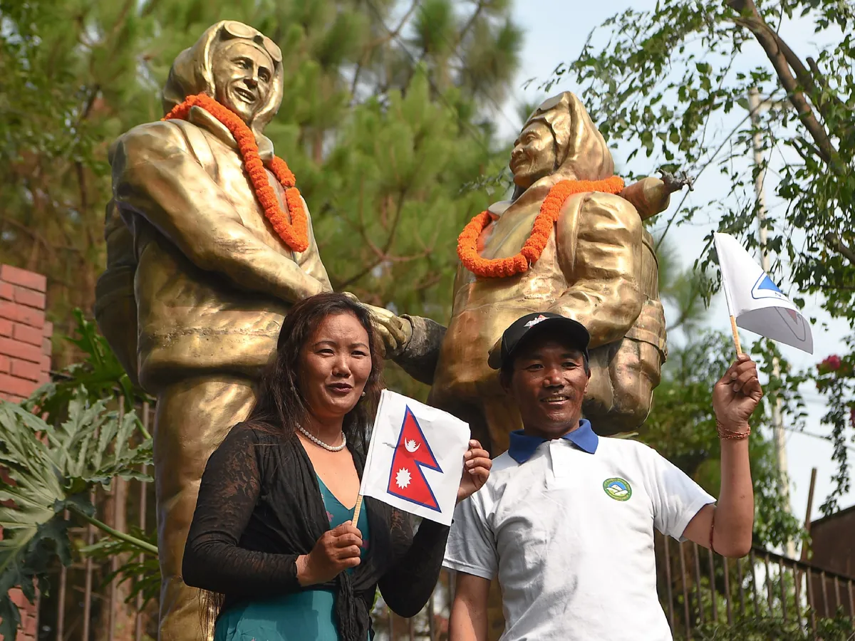 Two Nepali Sherpa climbers break own records on Mount Everest