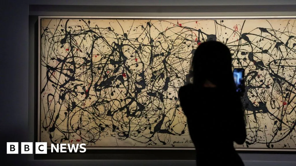 Jackson Pollock painting sells for record $181m at auction