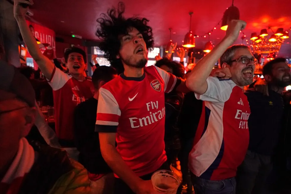 Arsenal wins its first Premier League title in 22 years after Man City draws with Bournemouth