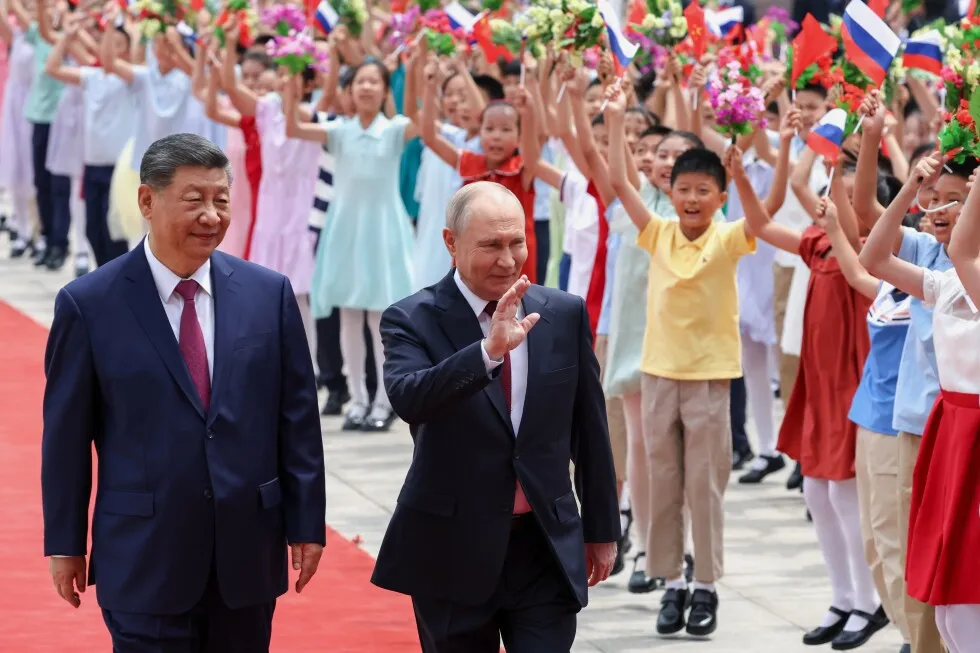 Xi and Putin highlight their friendship and cooperation on energy and other issues in Beijing visit
