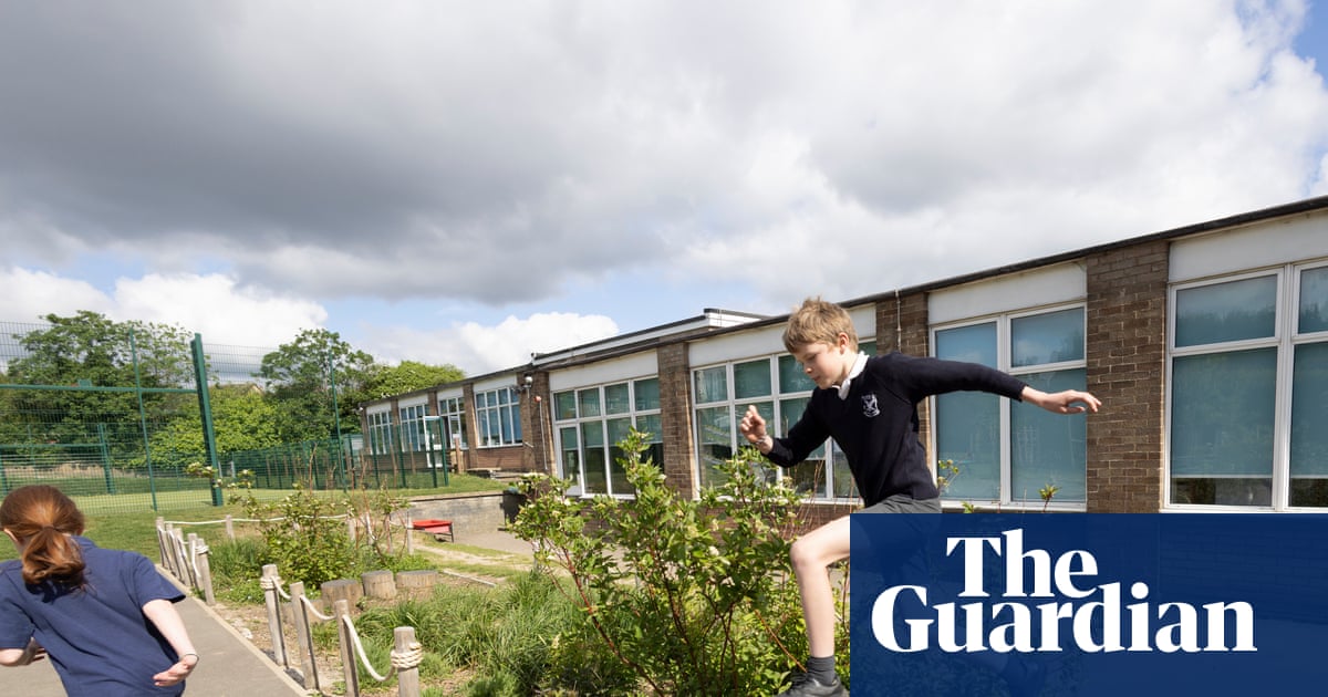 ‘It’s put the joy levels up’: the flood-prone London school with a climate-adapted playground