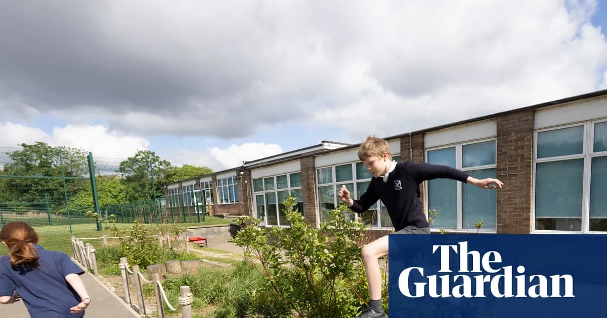‘It’s put the joy levels up’: the flood-prone London school with a climate-adapted playground