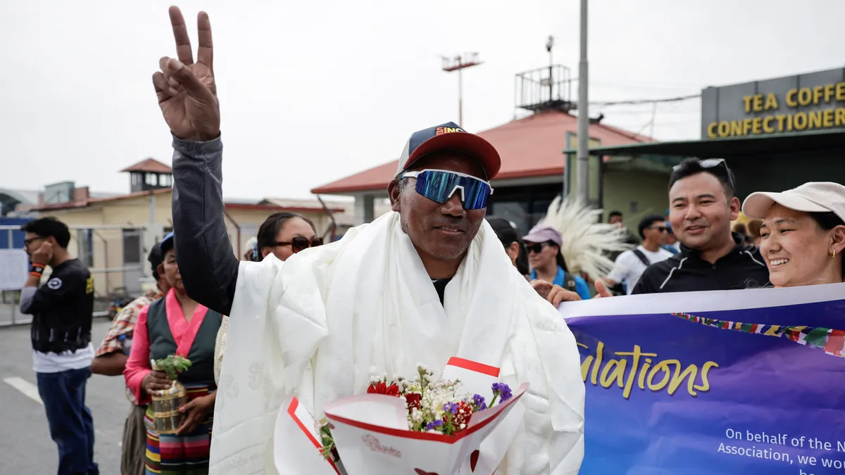 ‘Everest Man’ breaks his own record after historic 32nd climb