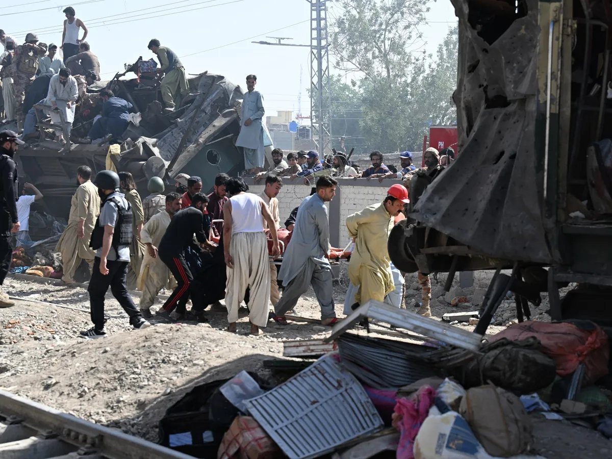 Suicide car bomb attack on train in Pakistan kills at least 24