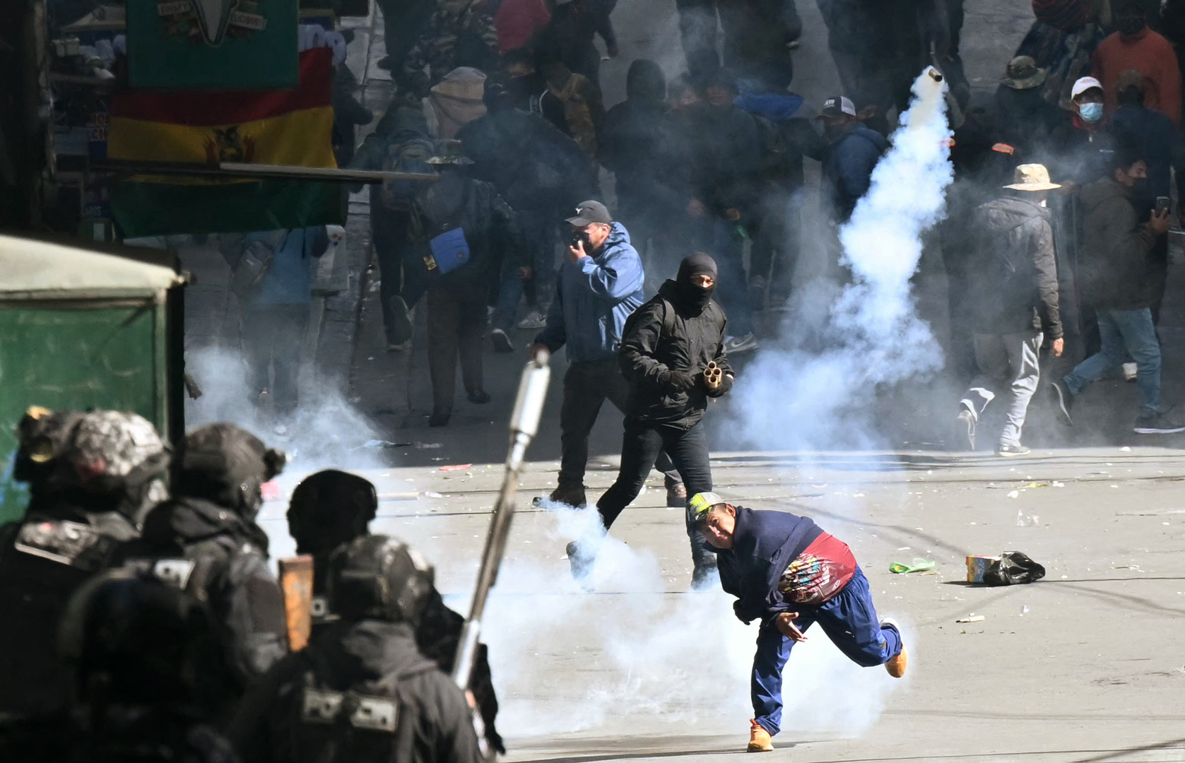 Tensions rise in Bolivia as protesters march toward presidential palace