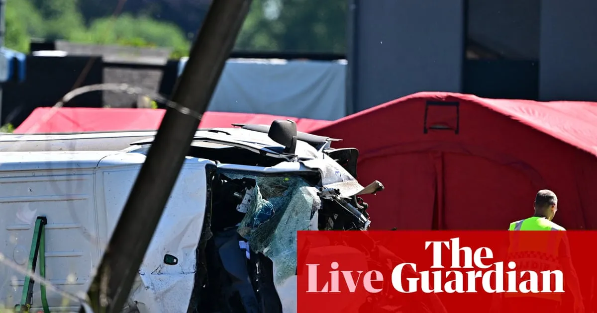Train and school bus collide in Belgium – Europe live