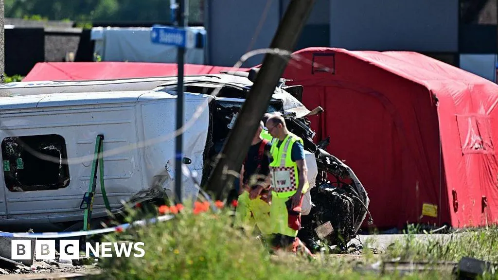 Four killed as school minibus collides with train in Belgium