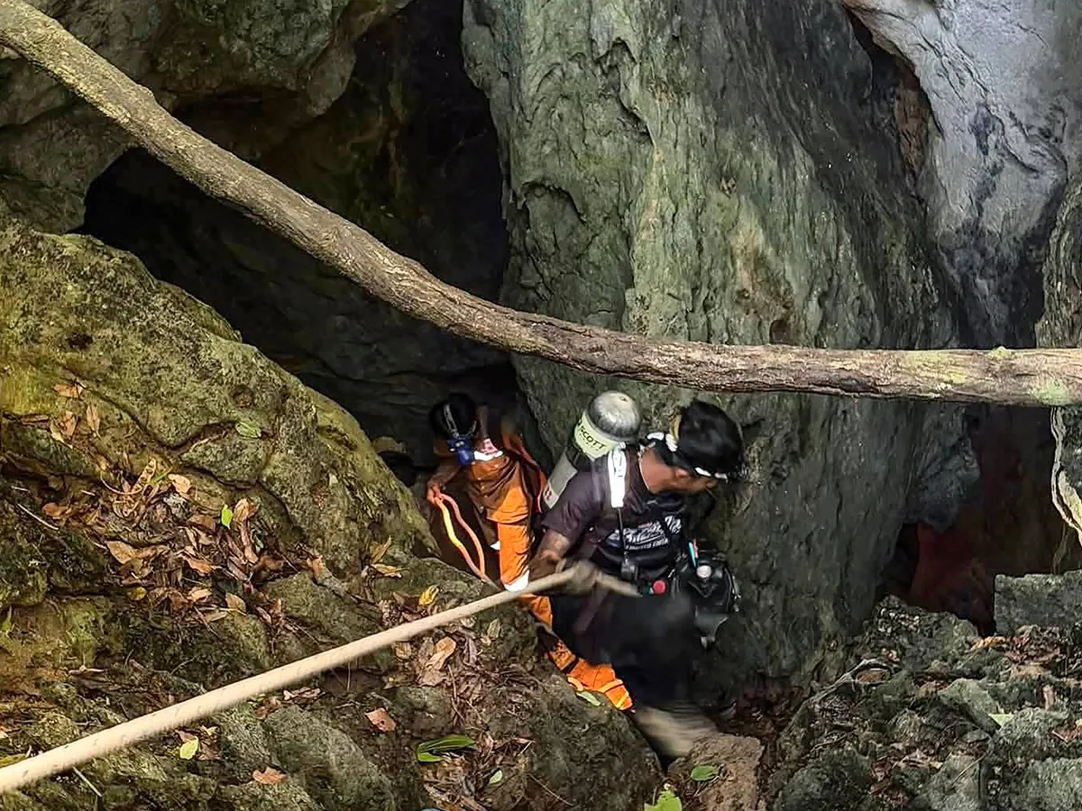 Rescue teams find five of seven trapped in Laos cave