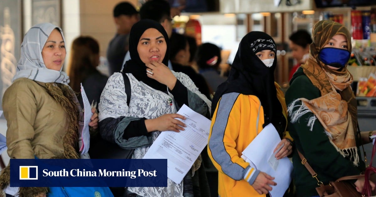 Homesick Filipino migrants count cost of separation for a ‘better’ future