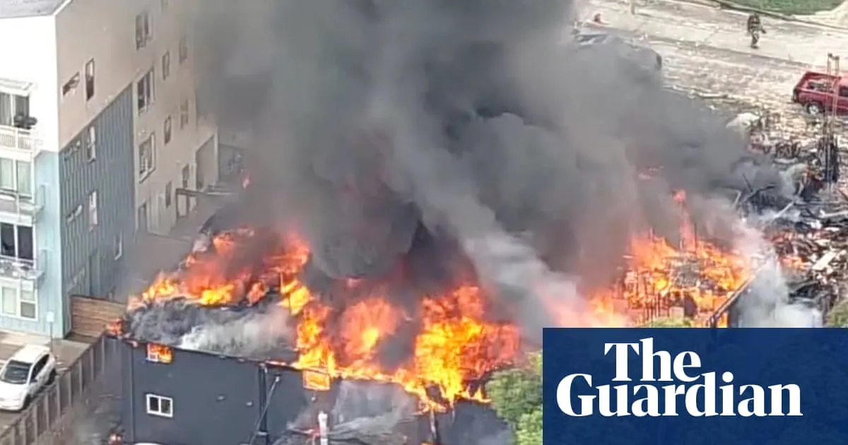 Dallas rescuers search for victims after gas explosion destroys building and ignites blaze