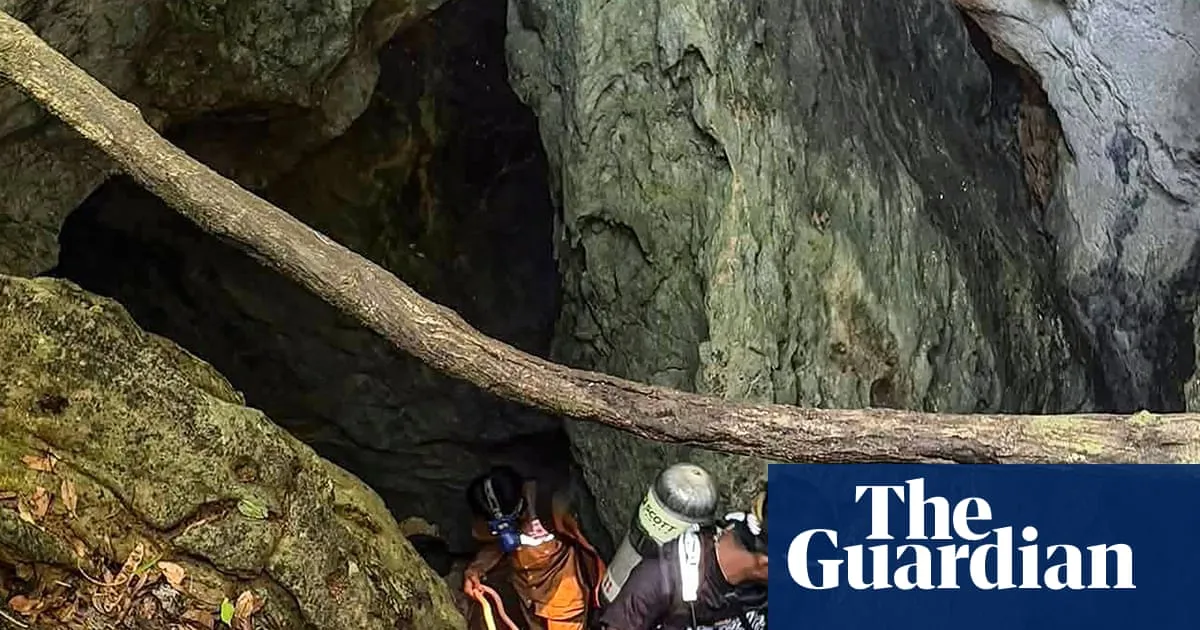 ‘Essentially diving in coffee’: Australian diver among team rushing to rescue people trapped in flooded Laos cave