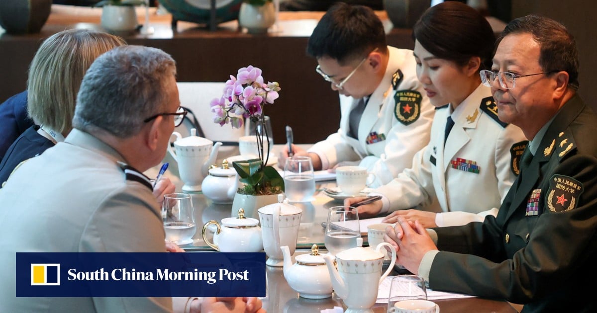 Chinese and UK officials at Shangri-La Dialogue vow to strengthen military ties