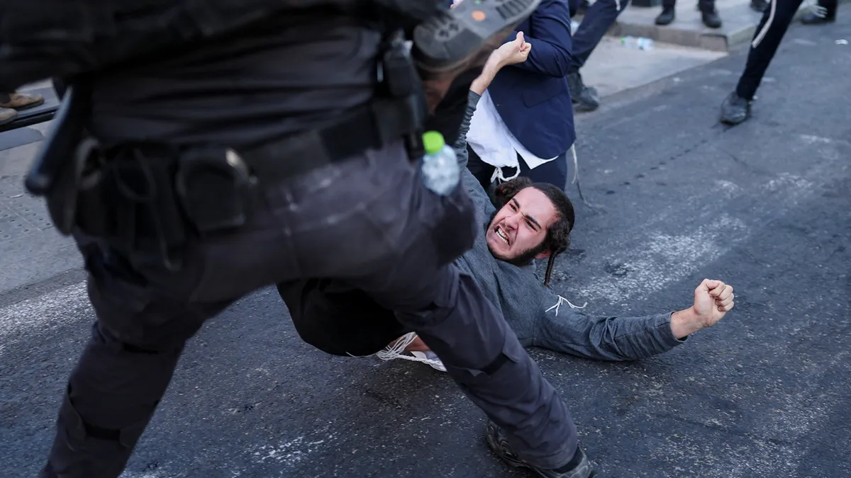 Ultra-Orthodox protesters clash with Israeli police over army draft