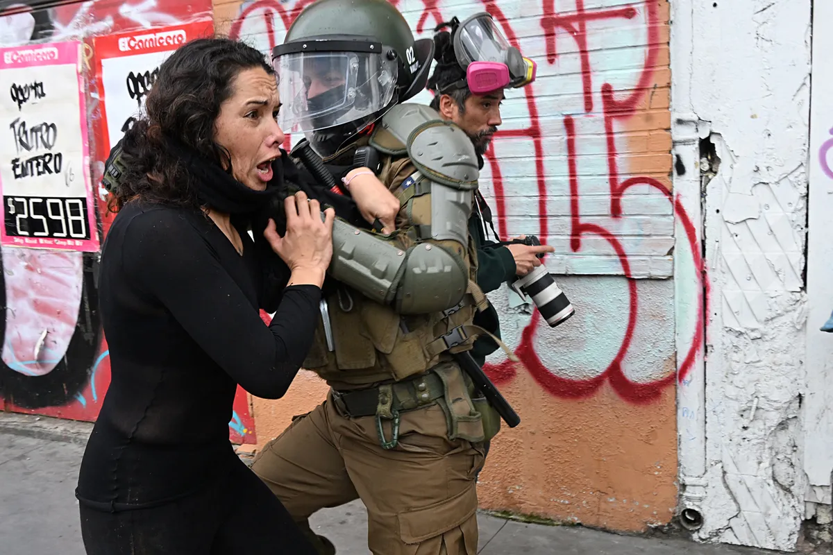 Violent protests erupt in Chile over government cuts of social programmes