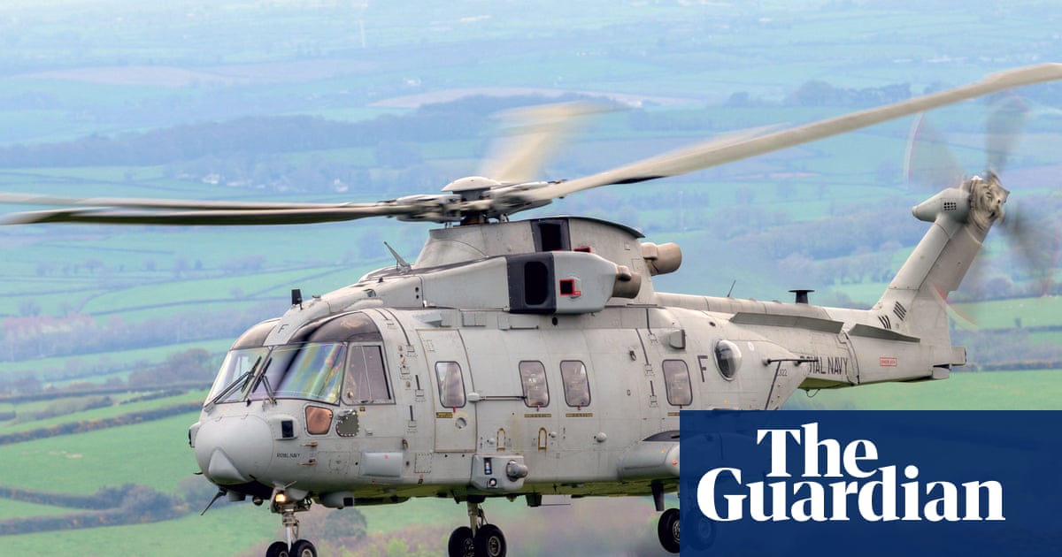 Royal Navy helicopter crashes into field in Devon