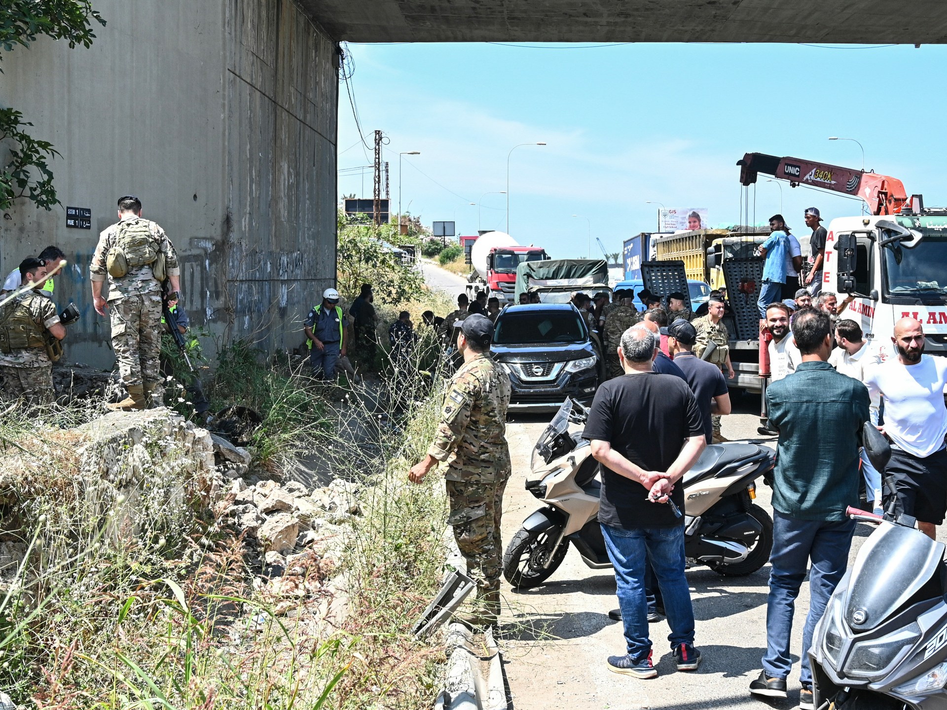 Israeli attacks kill nine in Lebanon, reach Beirut outskirts