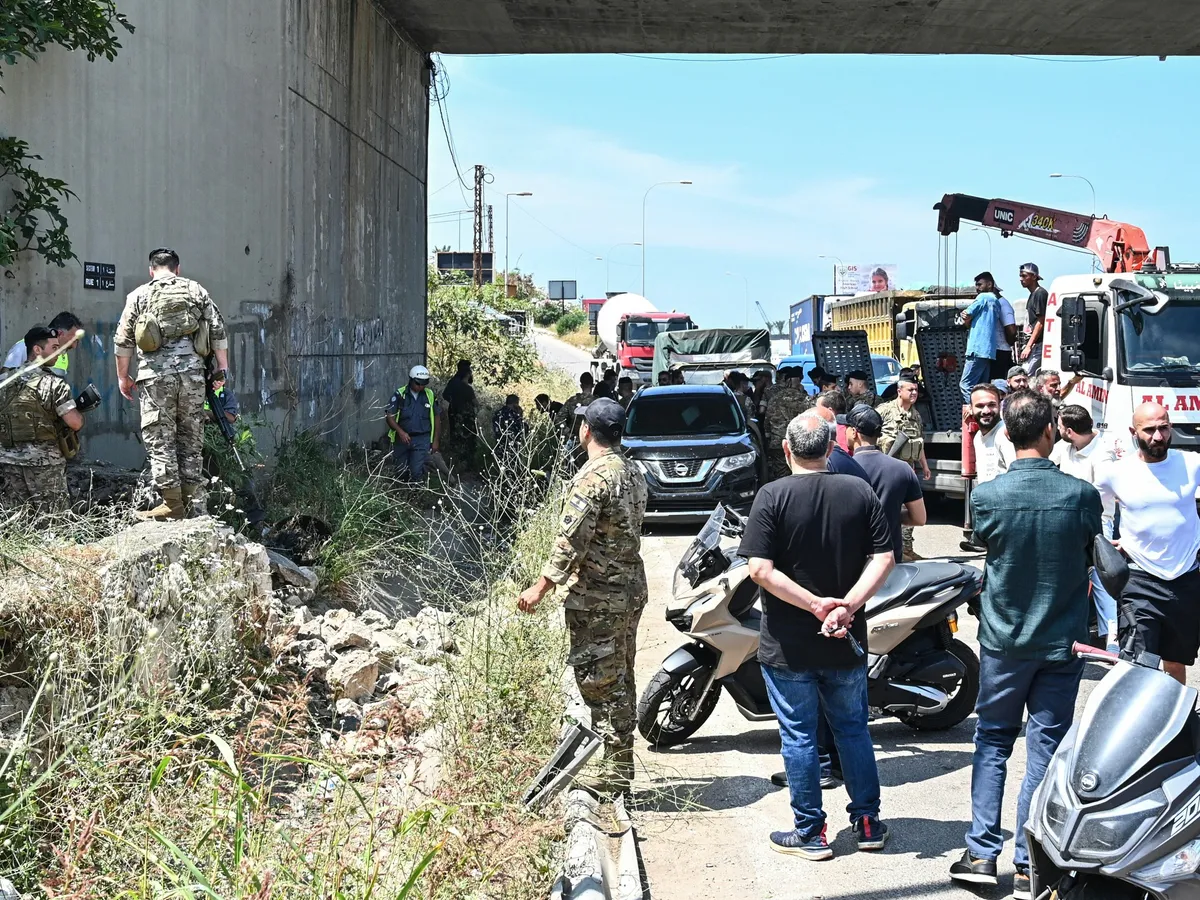 Israeli attacks kill nine in Lebanon, reach Beirut outskirts