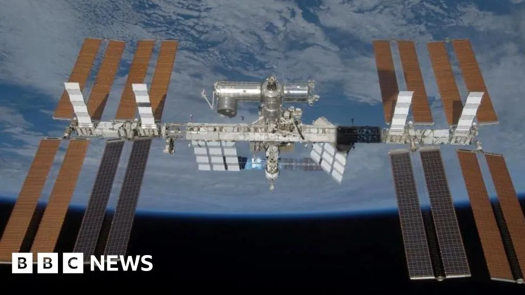 Astronauts return to ISS after sheltering during air leak repair attempt