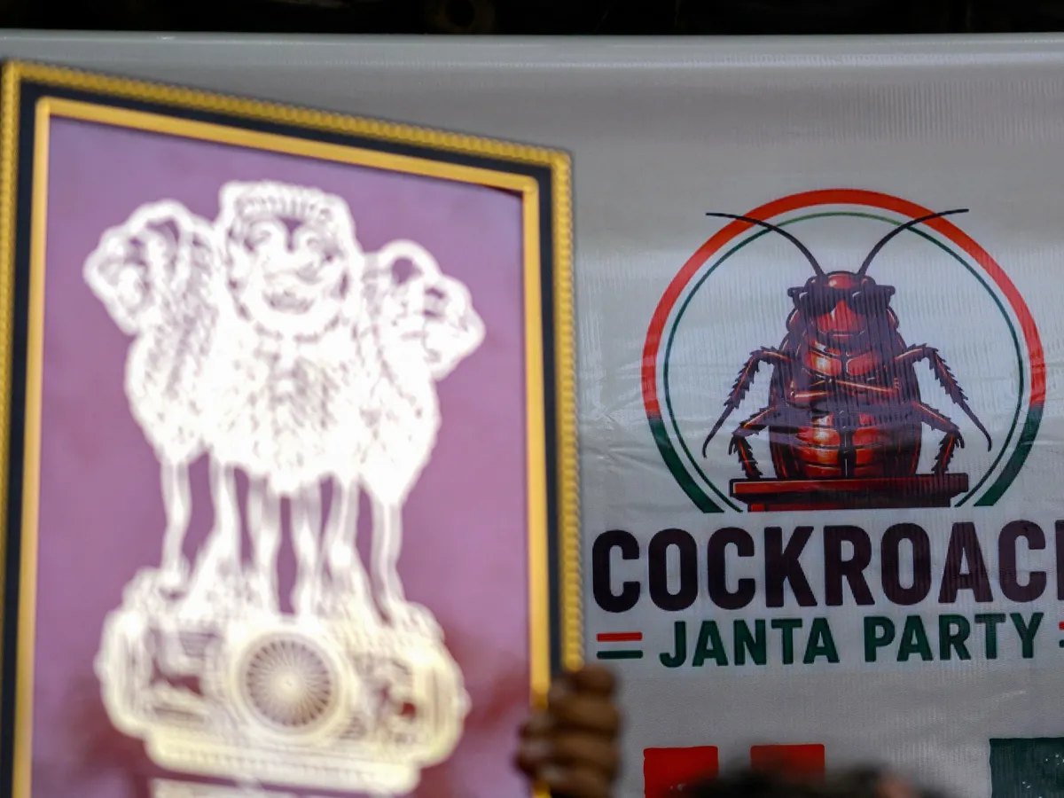 Supporters of the Cockroach People’s Party hold protest in New Delhi
