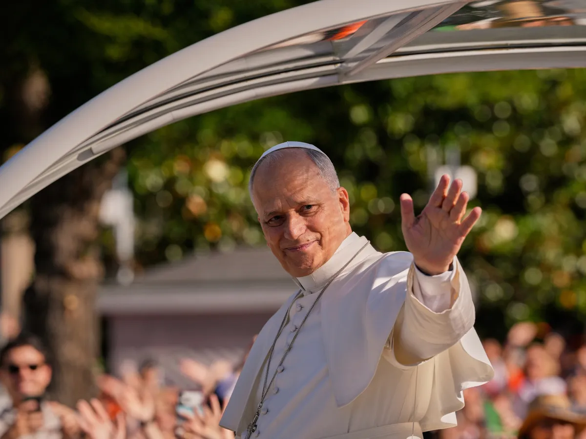 People flood Madrid streets to see Pope Leo’s flower-carpeted procession