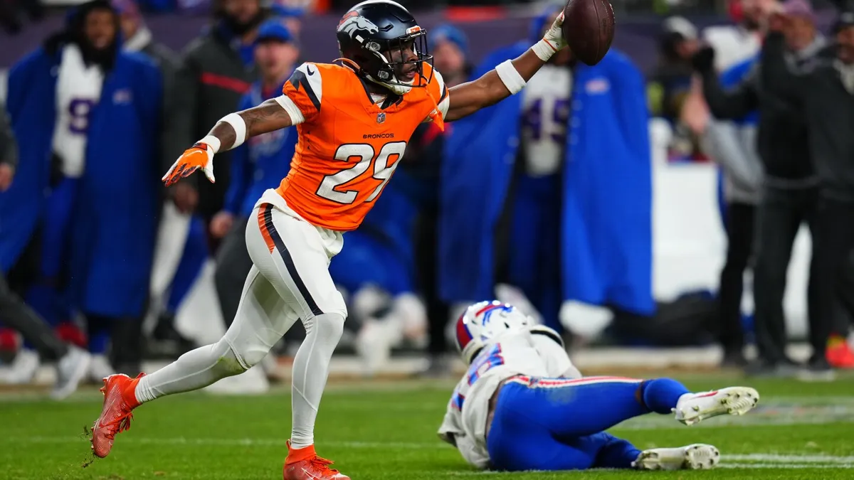 Broncos advance to AFC title game, beating Bills 33-30 after McMillian’s INT in overtime