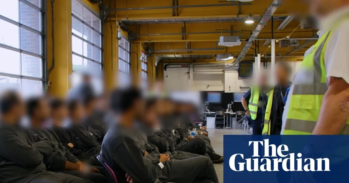 Staff at immigration detention centre wore England flags, report finds