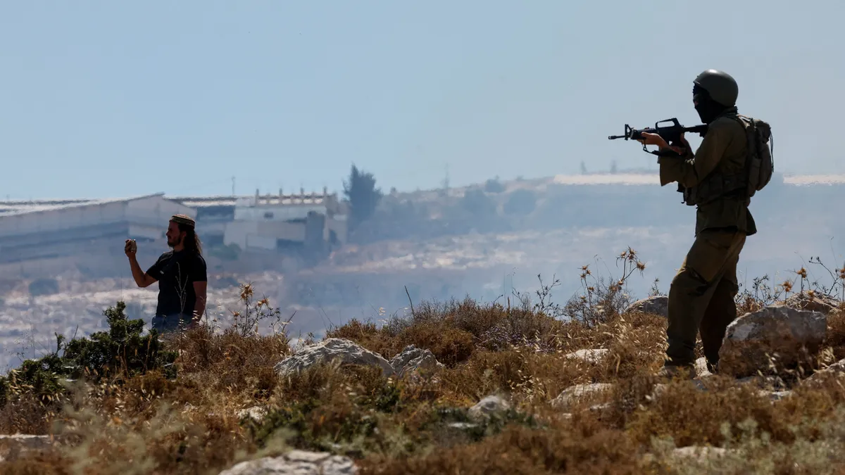 UN report: Israeli forces shield settlers during attacks on Palestinians