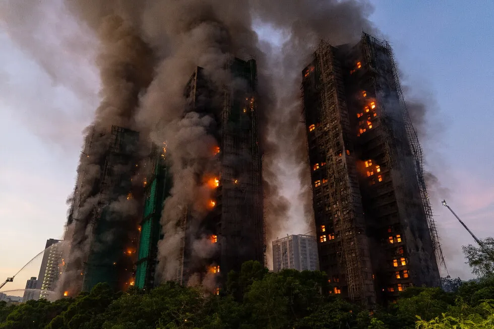 Hong Kong charges 7 people and 2 firms over deadly fire that killed 168