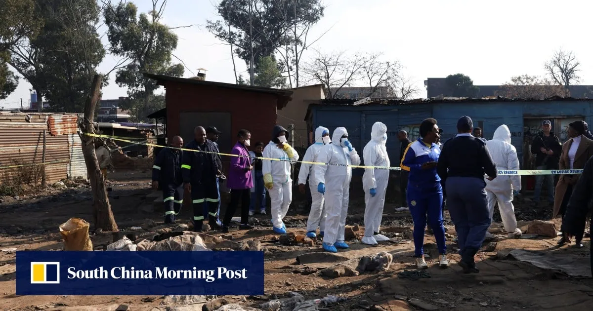 Manhunt in South Africa for attackers who killed 12 in mass shooting