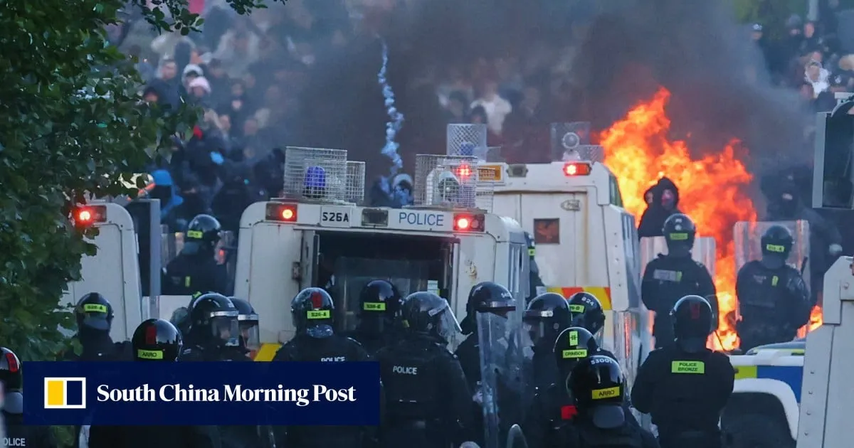 Police fire water cannon in Belfast as stabbing sparks second night of unrest
