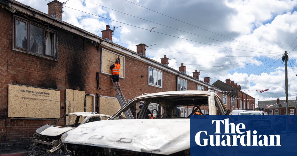 Police fire plastic bullets in effort to contain race riots in Northern Ireland