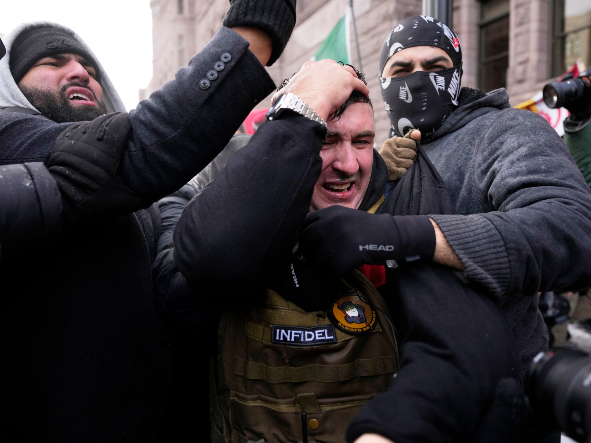 Anti-ICE rally chases off US far-right influencer Jake Lang in Minneapolis