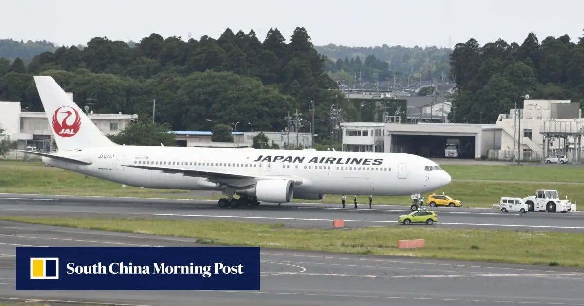 Pay cut for Japan Airlines boss after crew members hid preflight drinking