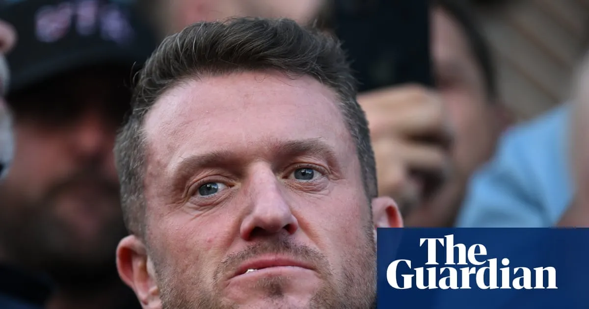 Police stop Tommy Robinson on his way back to London from Russian trip
