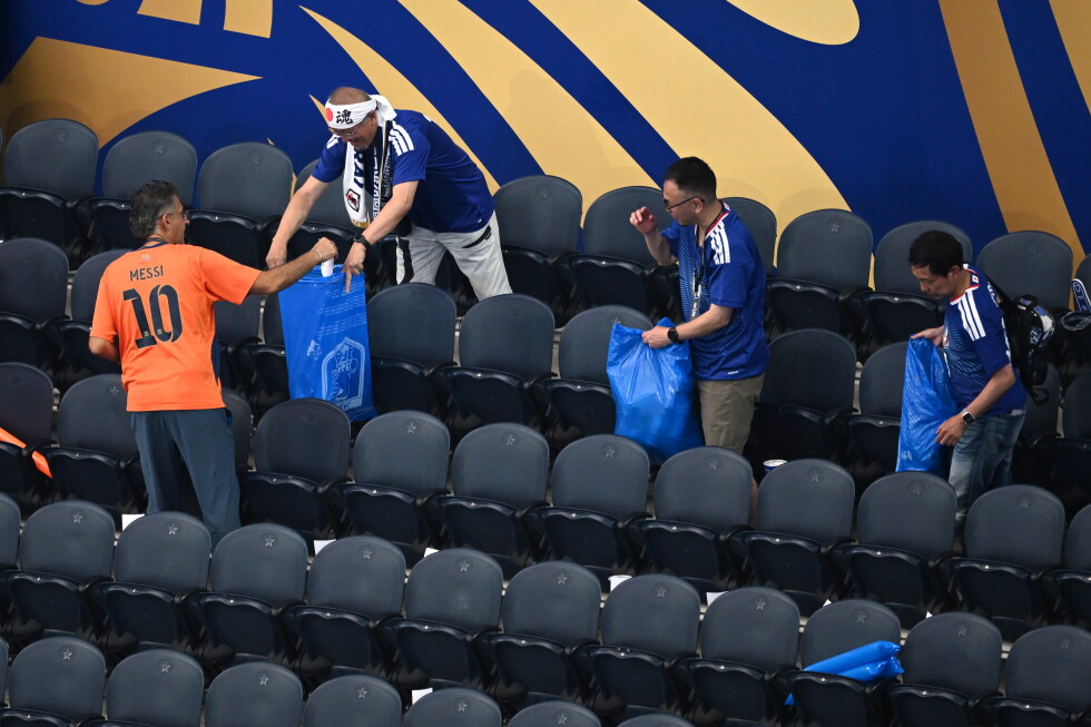 Japan fans use blue bags to uphold a cleansing World Cup tradition after draw