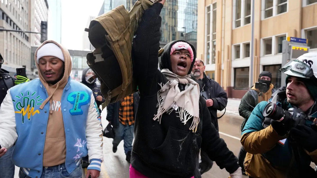 Counterprotesters chase off conservative influencer during Minneapolis immigration crackdown