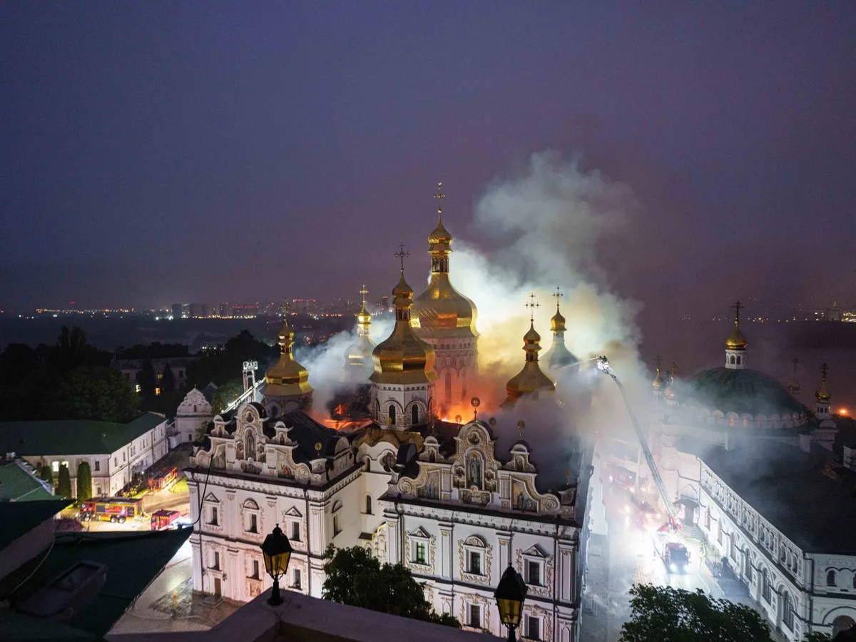 Kyiv cathedral burns as heavy Russian air raids hit Ukraine