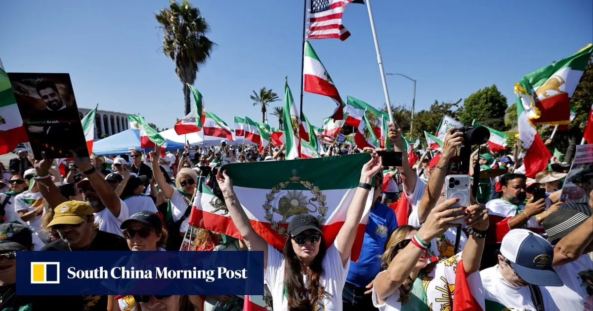 Iranian American protesters gather as football team prepare for World Cup opener
