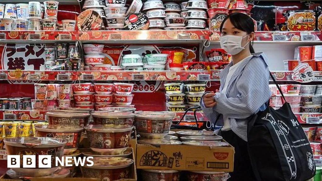 Japan raises interest rate to highest since 1995