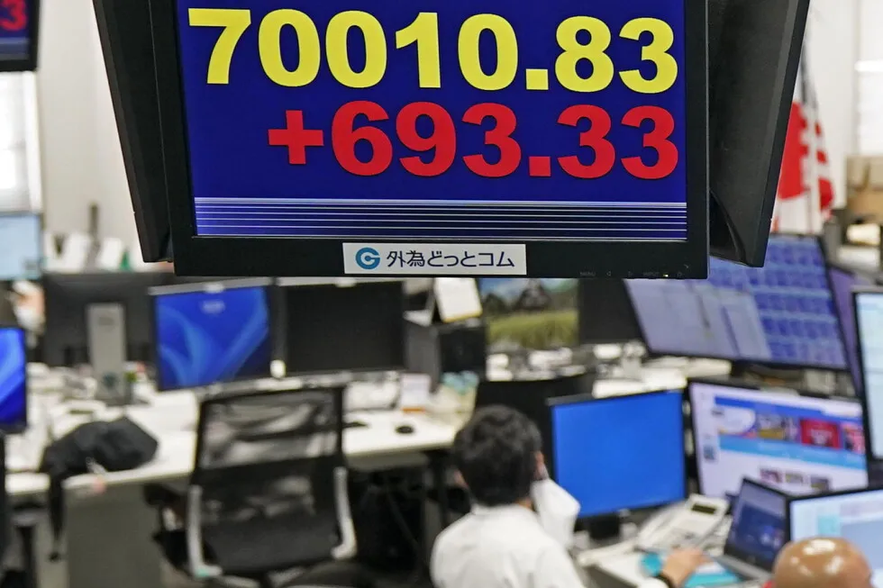 Asian shares are mostly higher and Japan’s Nikkei tops 70,000 before BOJ rate hike