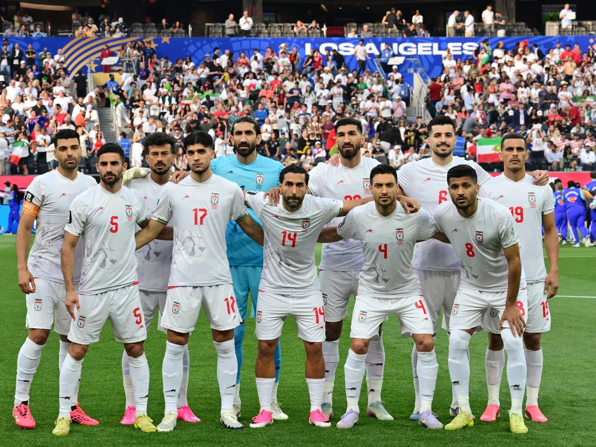 Football upstages politics as Iranians rally behind their team at World Cup