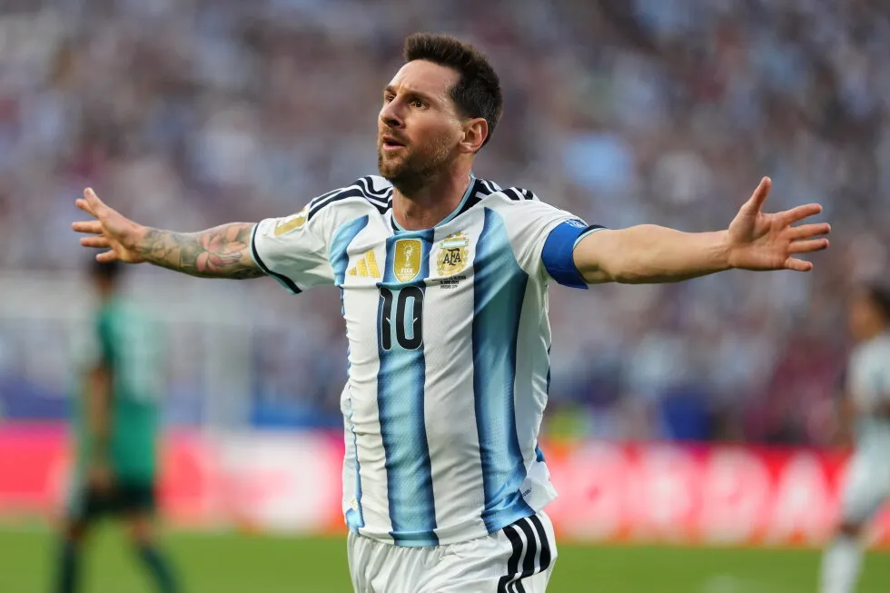 Lionel Messi ties men’s World Cup goals record with a hat trick as Argentina tops Algeria