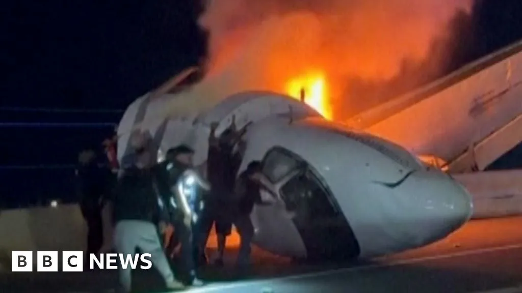 Bystanders smash windows of private jet to rescue passengers after crash