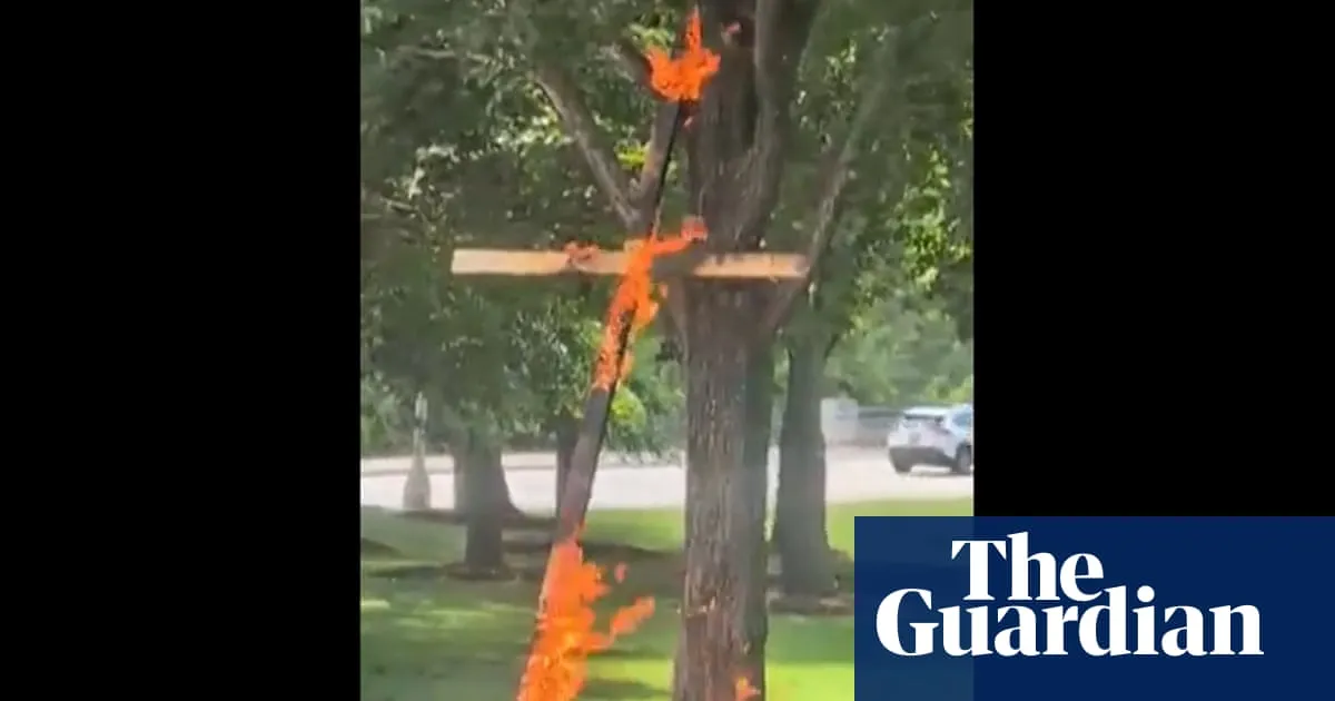 Man charged with hate crime over cross burning in Chicago park