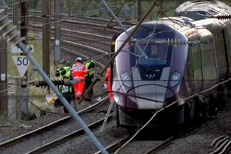 Two trains collide north of London, killing at least one person