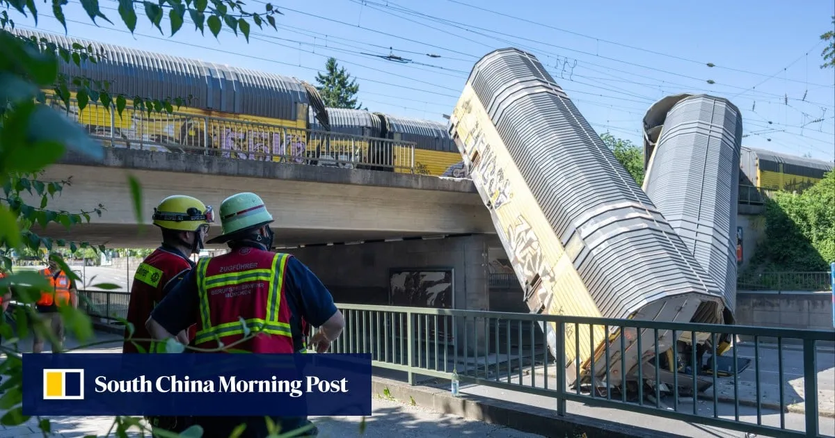 1 killed as freight train plunges from bridge in Germany after crash
