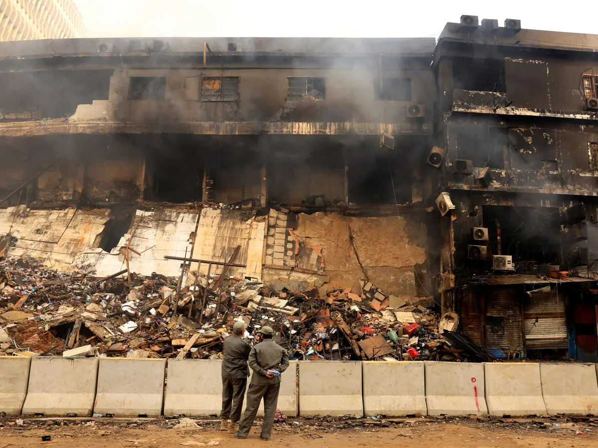 Death toll in Karachi mall fire rises to at least 14 in Pakistan