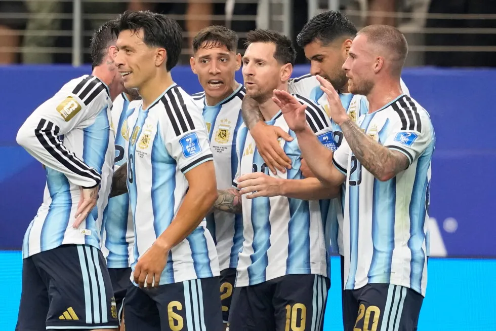 Messi sets World Cup scoring record as defending champion Argentina advances to knockout stage