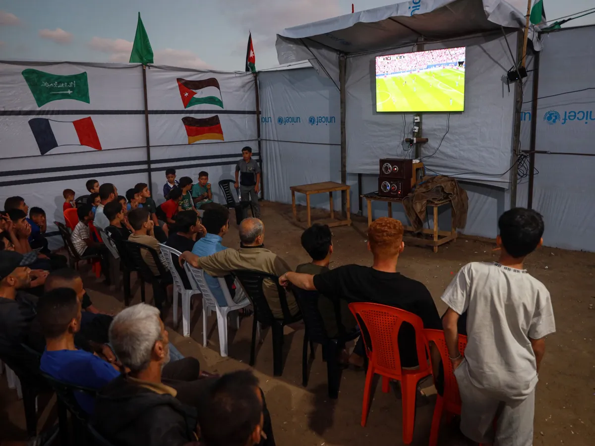 Football offers escape for Gaza, but World Cup spirit dimmed
